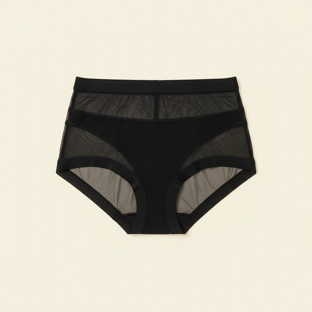 Black sheer mesh high-waist brief laid flat on a light background