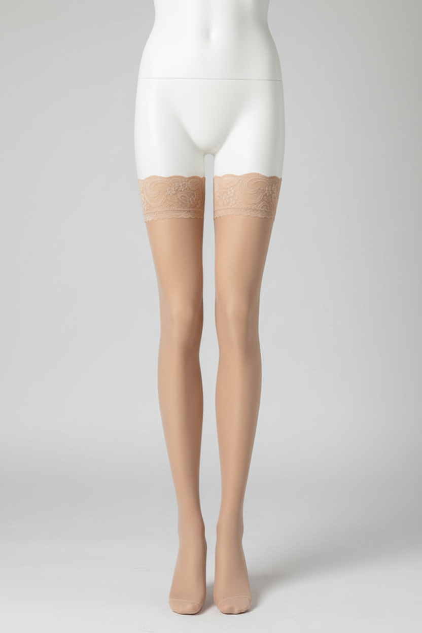 Nude sheer thigh-high stockings displayed on a white mannequin