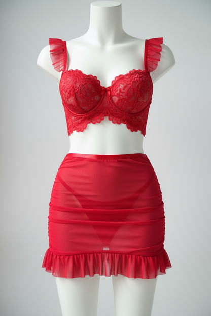 Front view of a red lace lingerie set with a ruffle skirt displayed on a mannequin