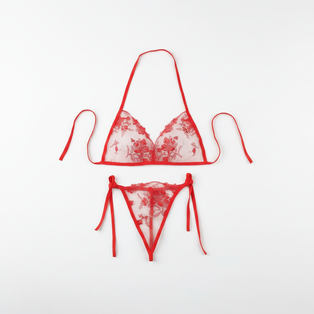 Red floral lace lingerie set arranged on a clean white background