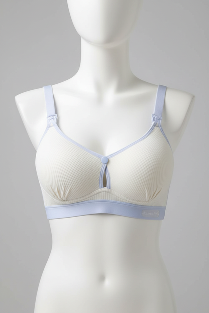 Ivory ribbed nursing bra with nursing clips displayed on a mannequin