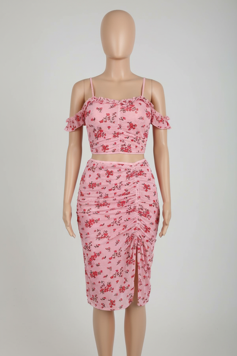 Pink floral off-shoulder two-piece outfit displayed on a faceless mannequin