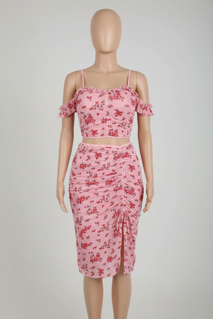Pink floral off-shoulder two-piece outfit displayed on a faceless mannequin