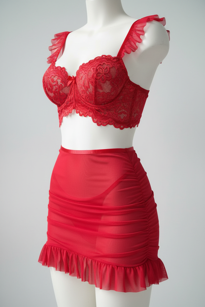 Red lace lingerie set with a ruffle skirt displayed on a mannequin